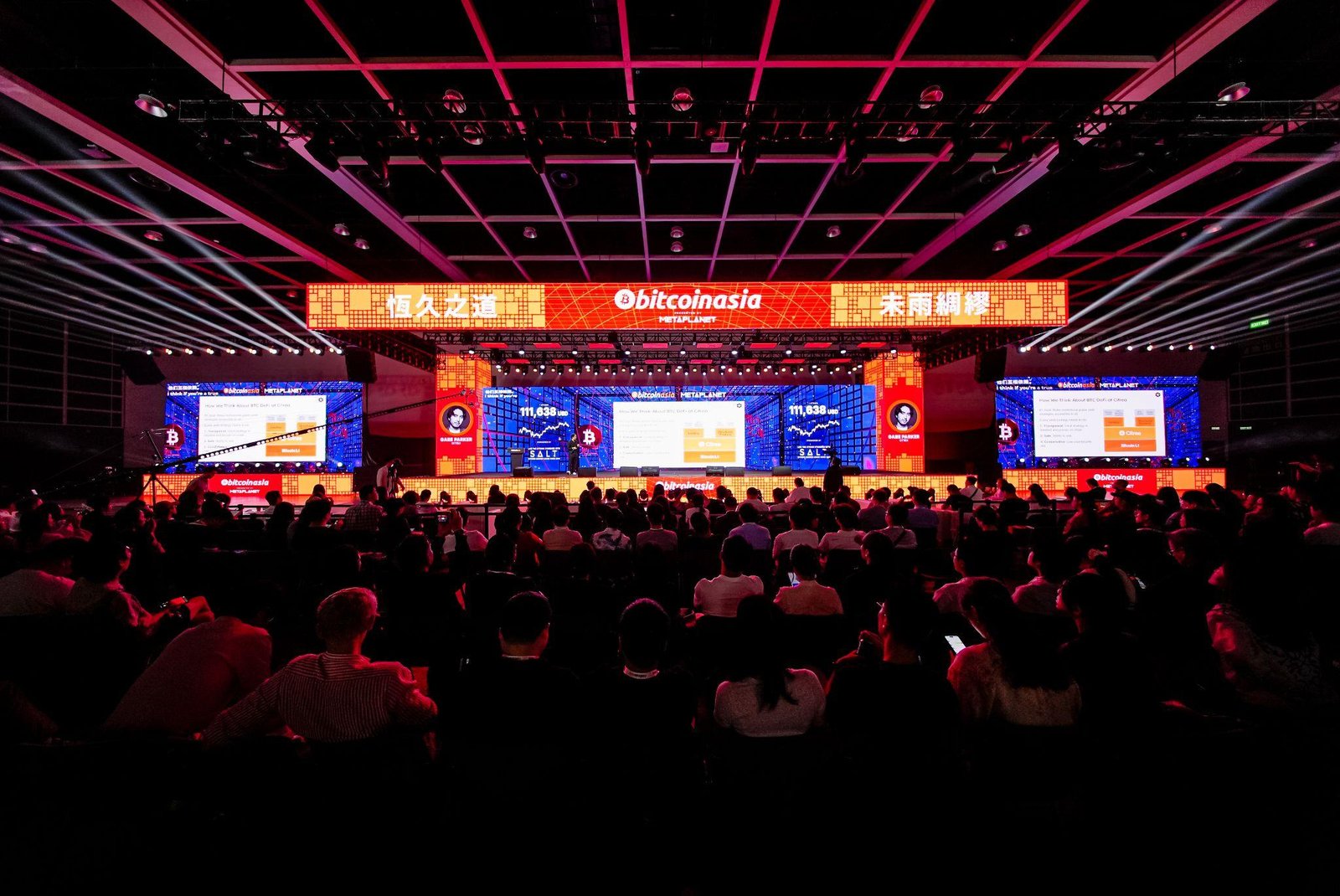 Mainstage at the Hong Kong Convention & Exhibition Centre — packed audience watching a panel under BTC Asia branding.