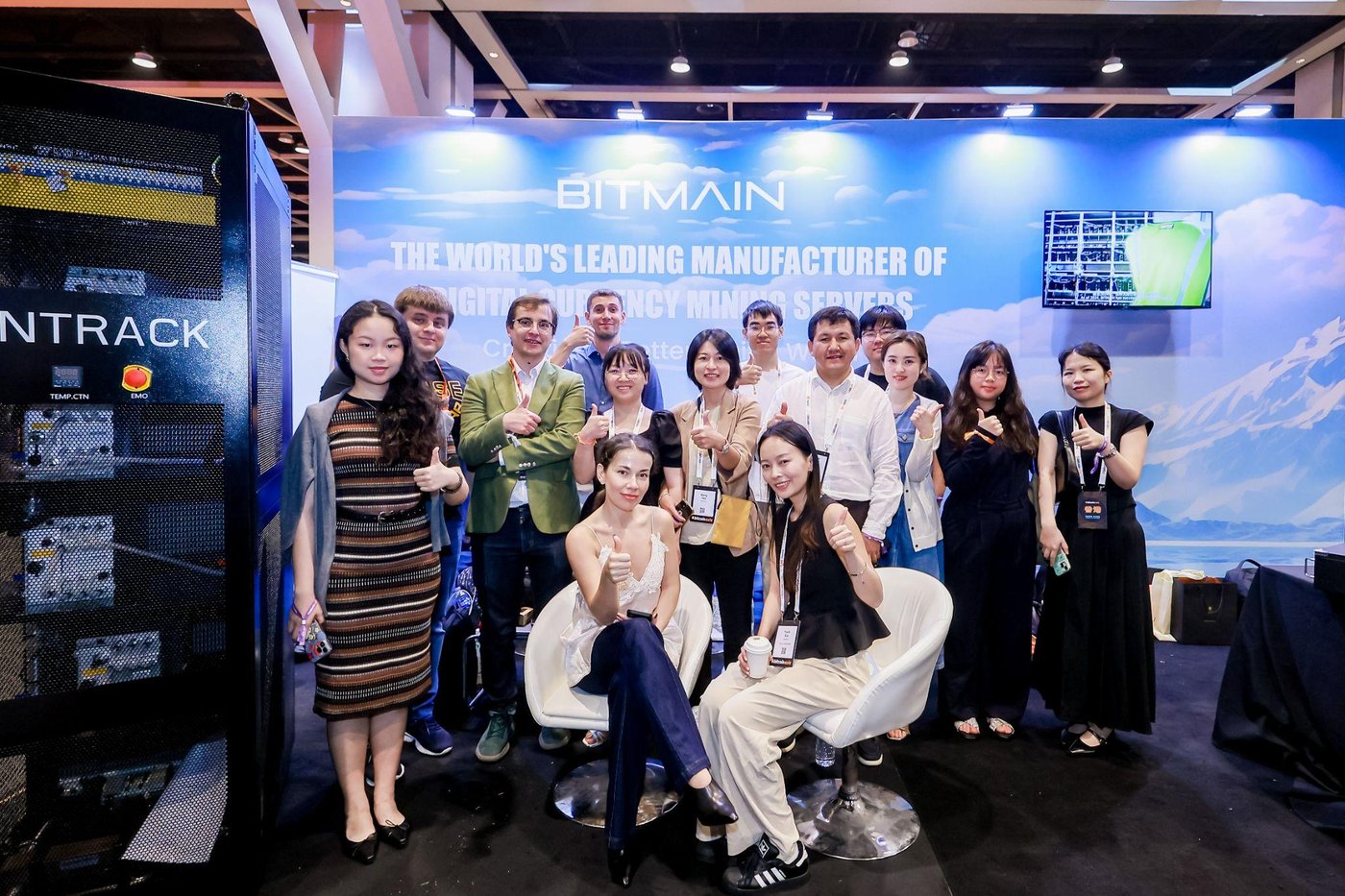 Sponsor booth team at the Bitmain stand.